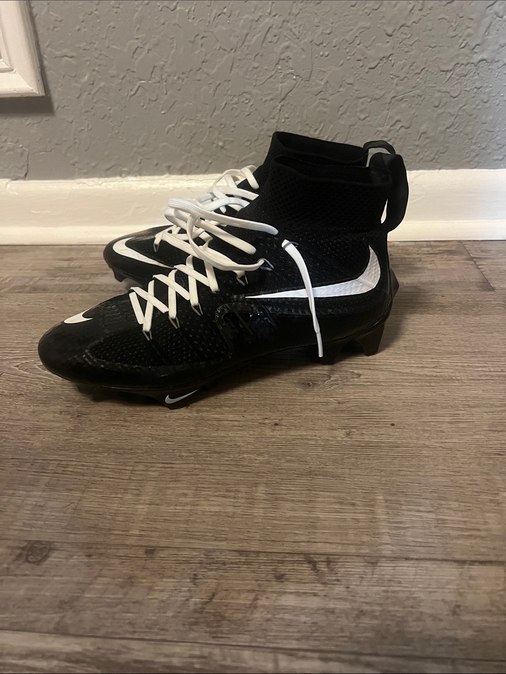 Nike Black and White Kids Mid-Top Cleat Sneakers
